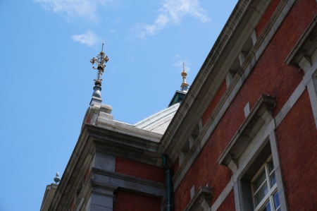 Decorations (rods) on the four corners of the Red Brick Building roof