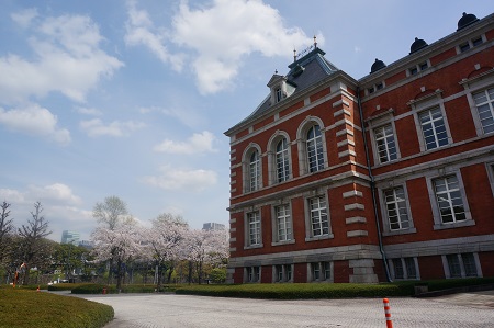 Photograph from the west side of the Red Brick Building in sunlight